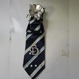 Elegant Striped Tie with Silver Accents